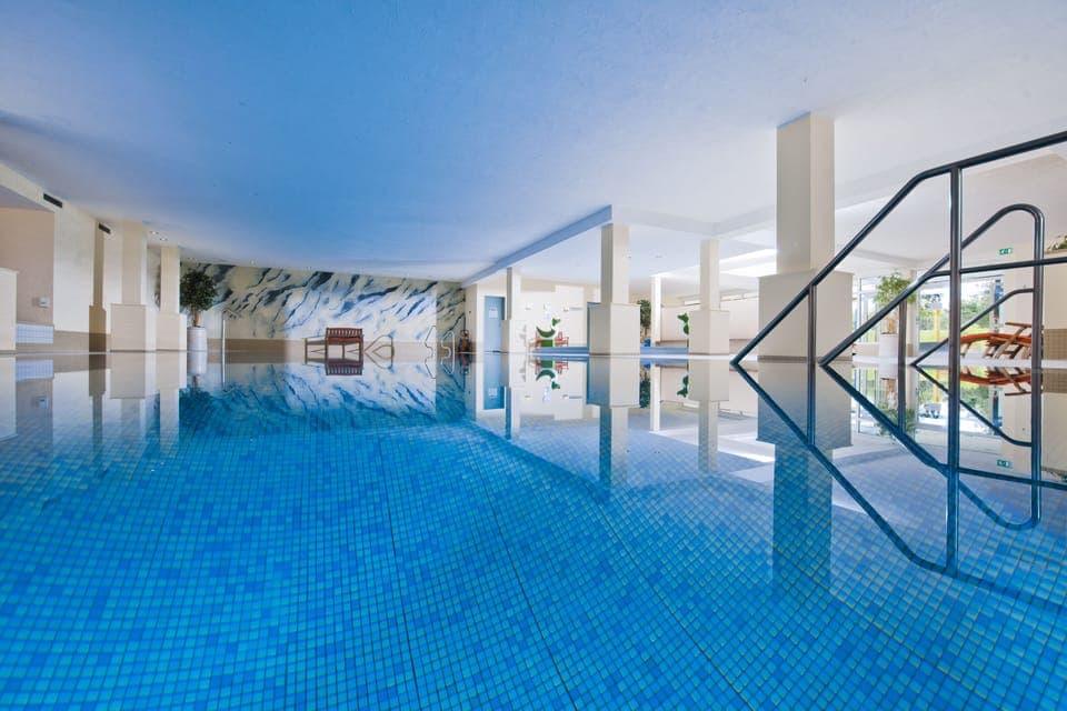 Indoor pool, open 7:00 AM to 10:00 PM, sun loungers