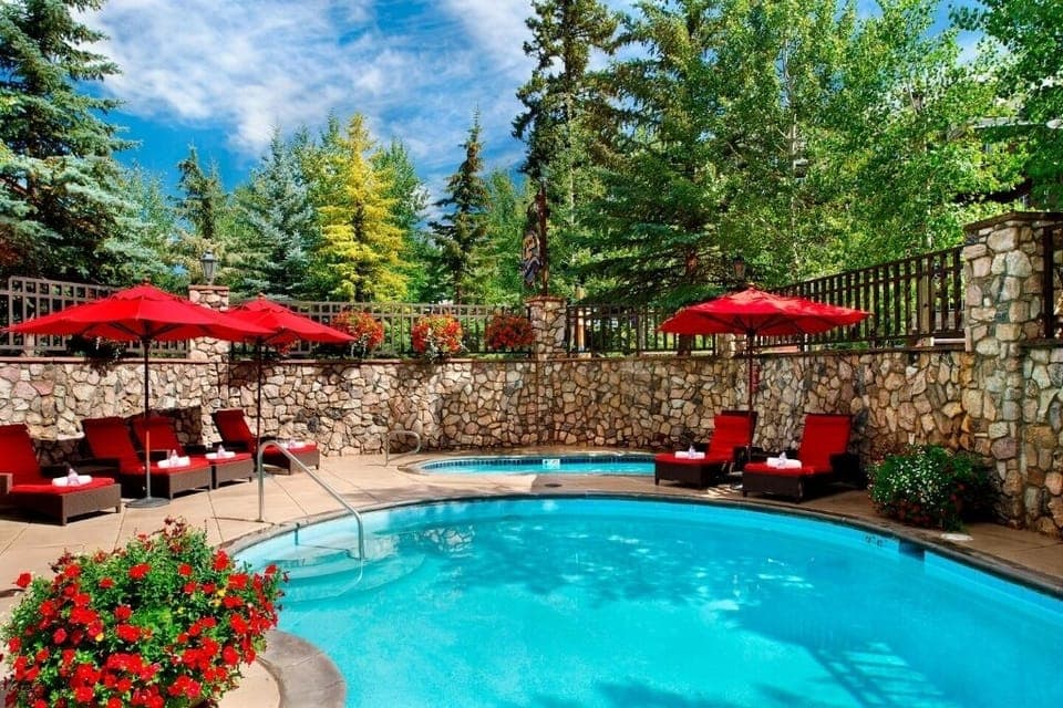 Hotel pool/hot tub with inside entrance to pool (swim under glass in winter)