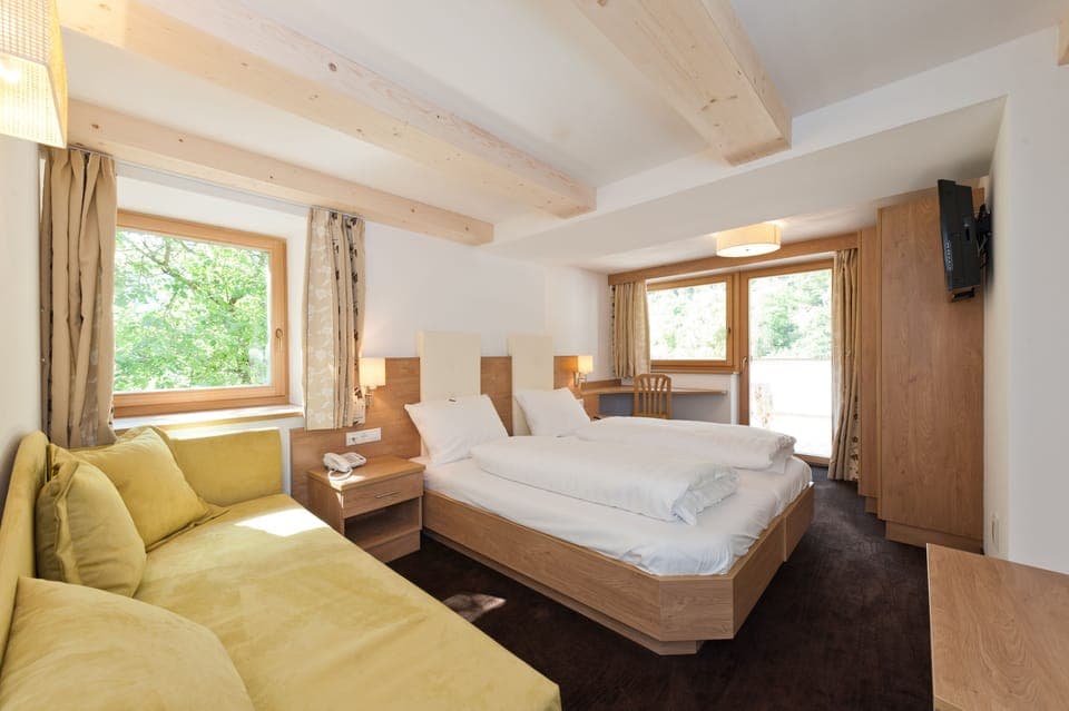 Down comforters, memory foam beds, desk, blackout drapes