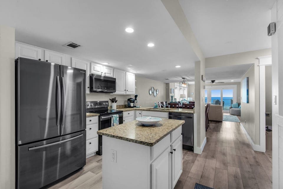 Bright and airy space with modern appliances and stunning ocean views
