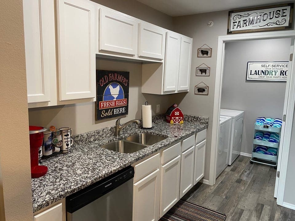 Newly remodeled kitchen has full size appliances and granite countertops 