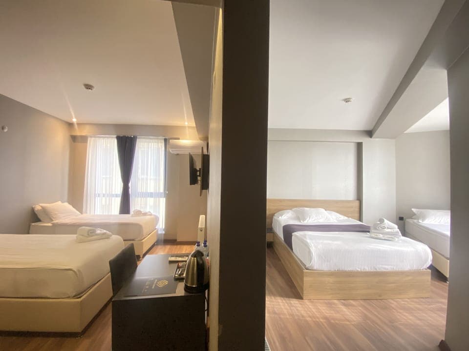 Family Suite, 2 Bedrooms, Non Smoking, City View | Premium bedding, minibar, desk, laptop workspace