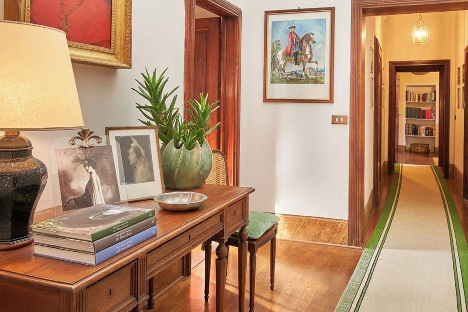 Spacious Corridor on the First Floor Leading to Elegant Suites