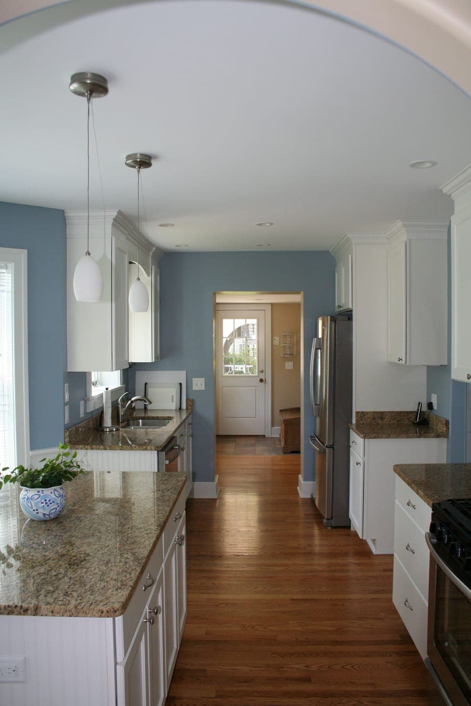 Large, open, modern kitchen with huge island.