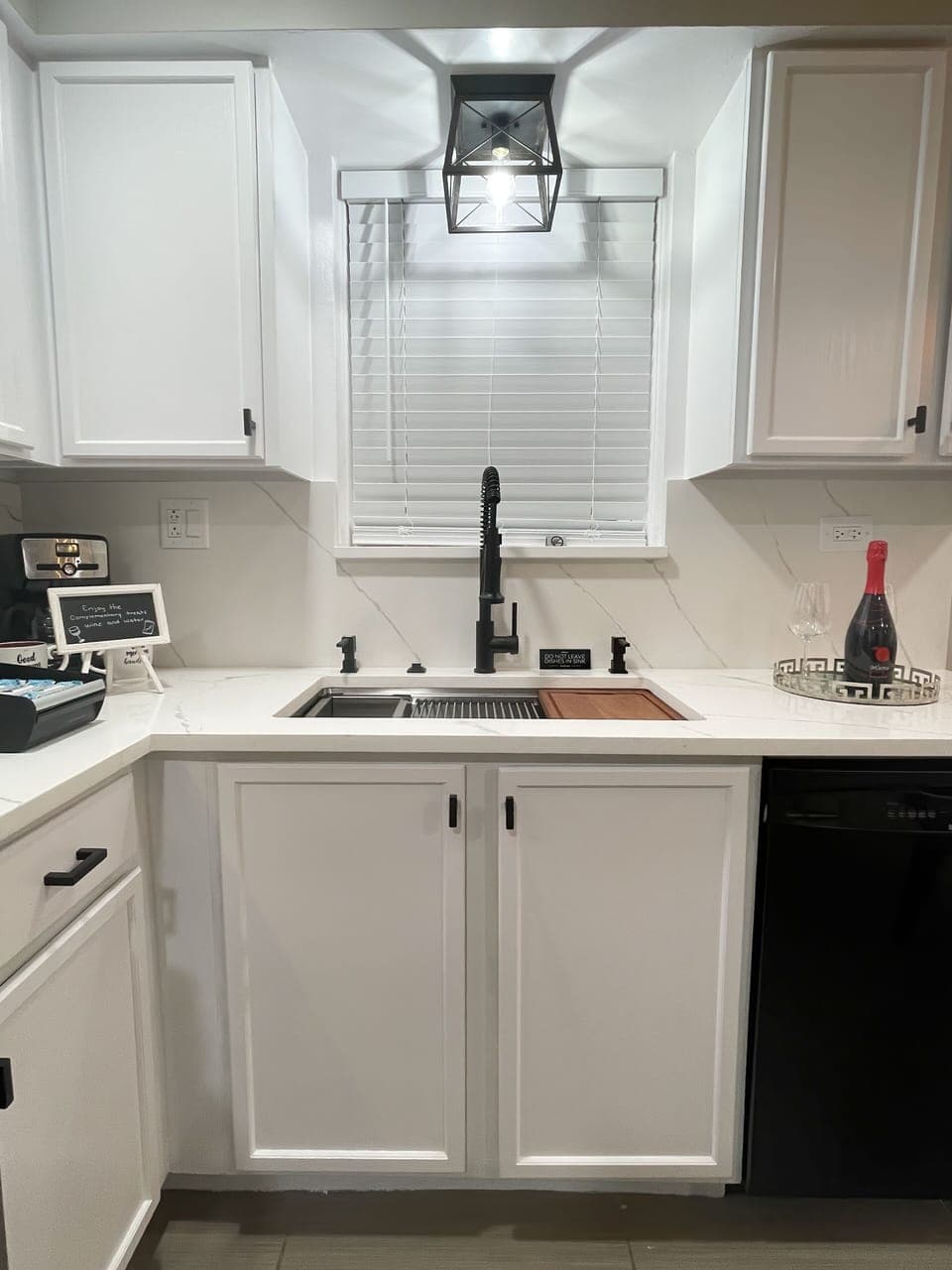 WOW! Amazing fully stocked kitchen with quartz countertop, full backsplash, etc.