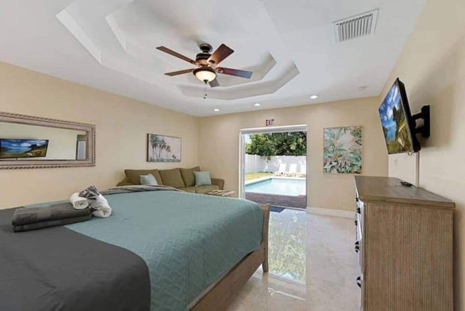 Bedroom with easy access to pool.