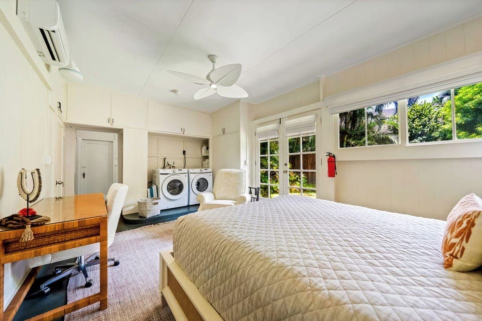 The washer and dryer is located in the thrid bedroom