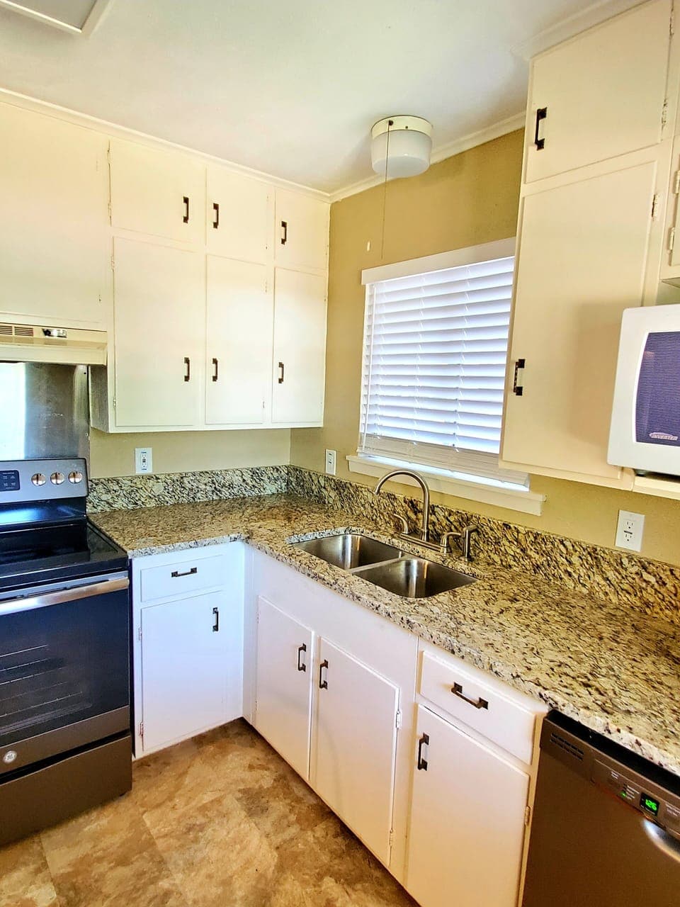 All new stainless steel appliances & granite counters. 