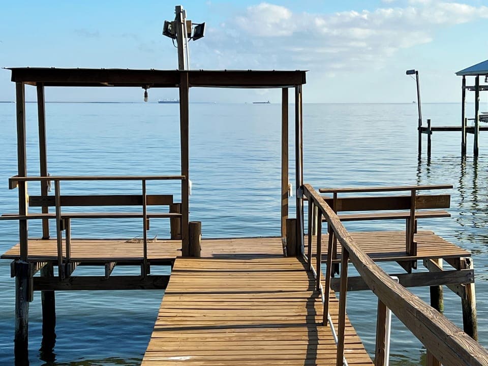 end of pier has cover to get out of the sun enjoy sunsets and sunrises fishing