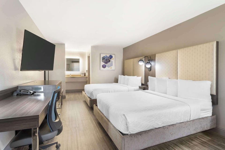 Standard Room, 2 Queen Beds, Non Smoking | In-room safe, desk, laptop workspace, soundproofing