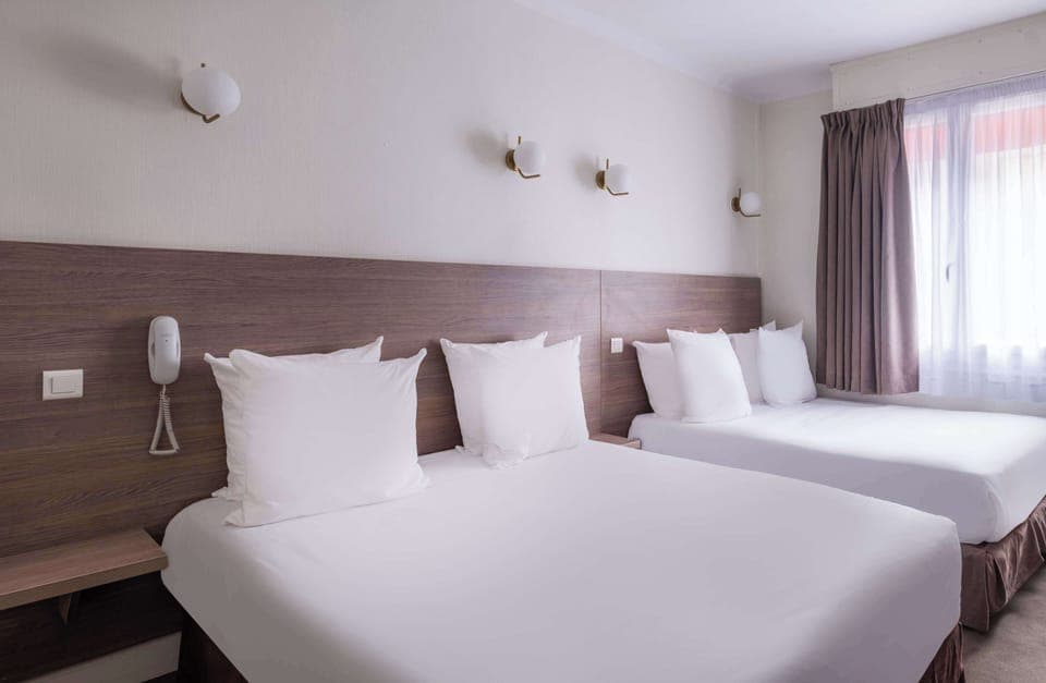 Standard Room, Multiple Beds, Non Smoking | Premium bedding, desk, laptop workspace, blackout drapes