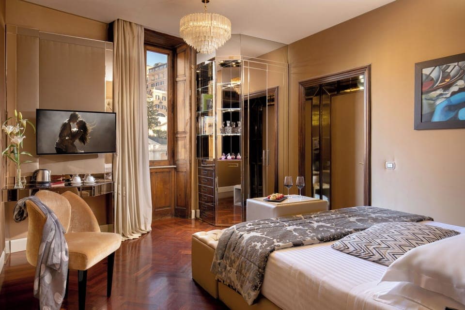 Premium bedding, down comforters, pillowtop beds, minibar