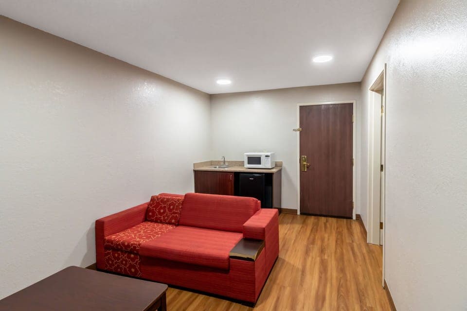 Suite, 1 King Bed, Non Smoking | Desk, iron/ironing board, free cribs/infant beds, rollaway beds