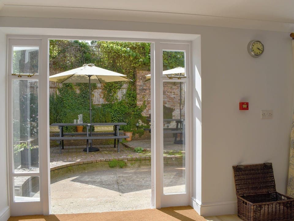 Doors leading to outside area | The Town House, Wimborne