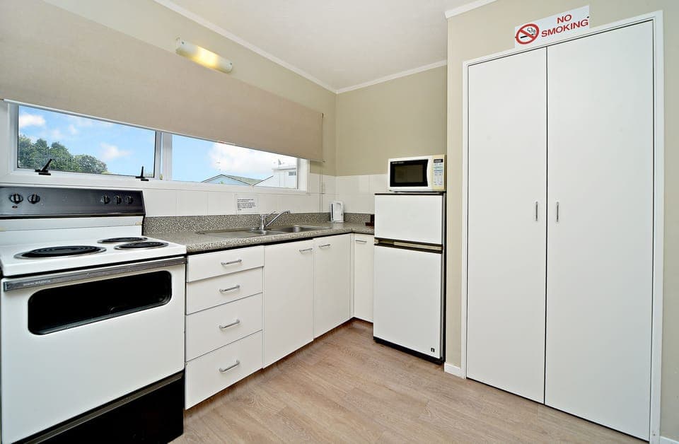 Standard Apartment, 2 Bedrooms | Private kitchen | Fridge, microwave, stovetop, coffee/tea maker