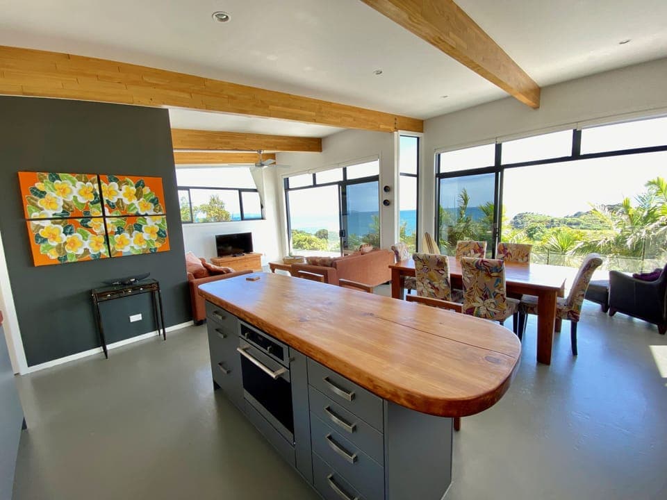 Open plan spaces in the front house for cooking, eating and relaxing.