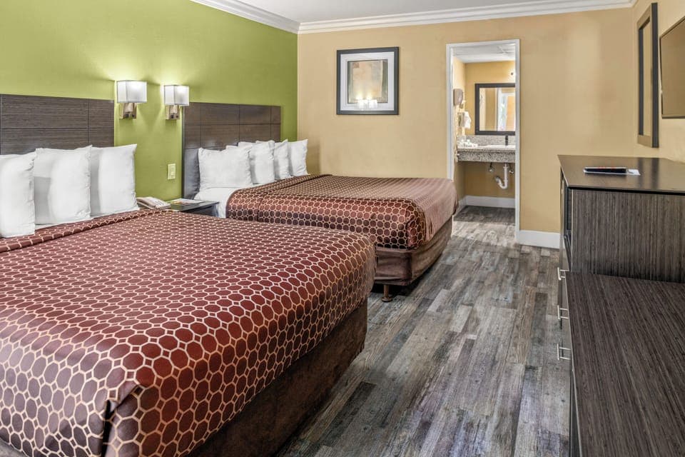 Standard Room, 2 Queen Beds | In-room safe, desk, free WiFi, bed sheets