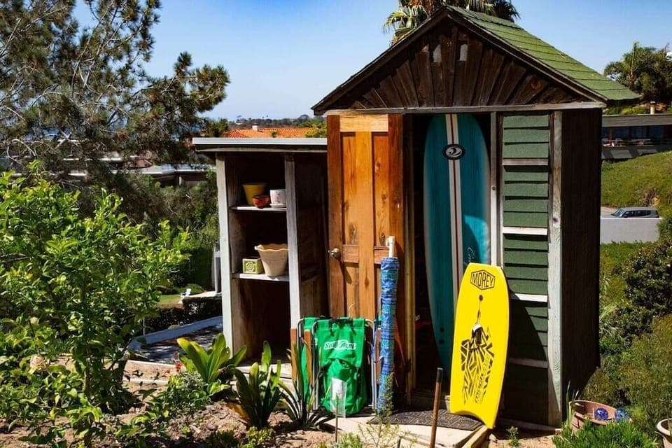 Beach gear is stored in the garden shed