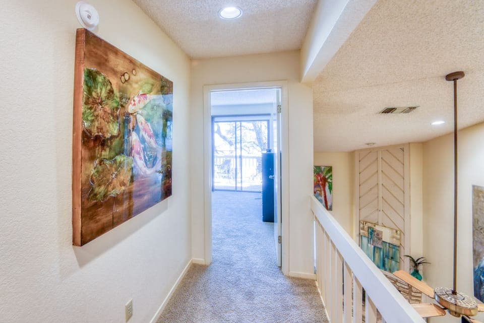 Walkway to 3rd bedroom with pond theme