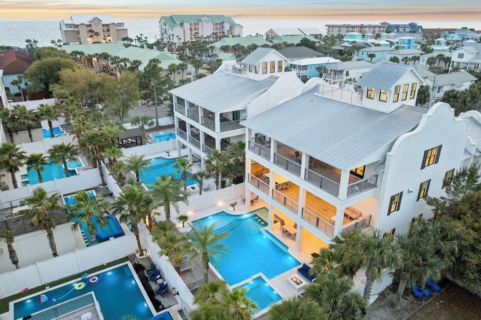 This stunning estate features a massive resort style pool and luxury amenities in a prime coastal setting.