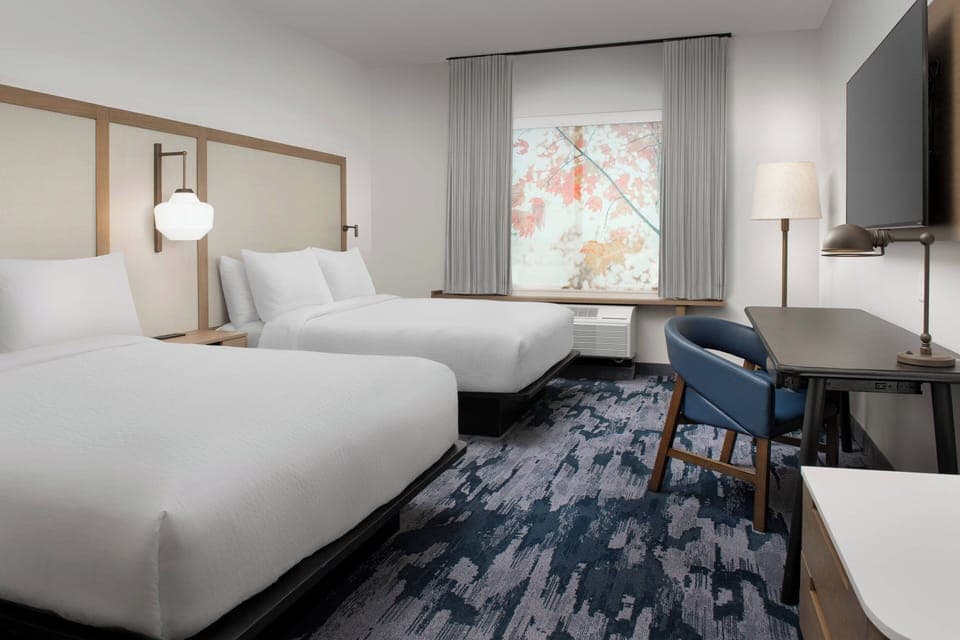 Hypo-allergenic bedding, pillowtop beds, in-room safe, desk
