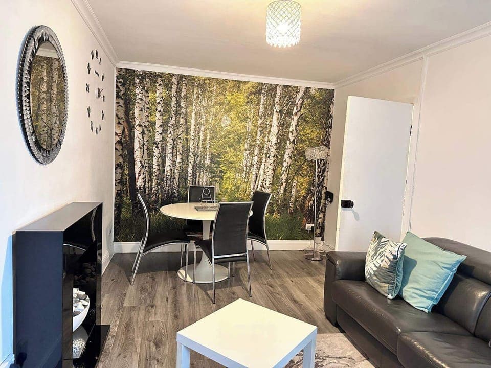 Apartment | Living area | TV, fireplace