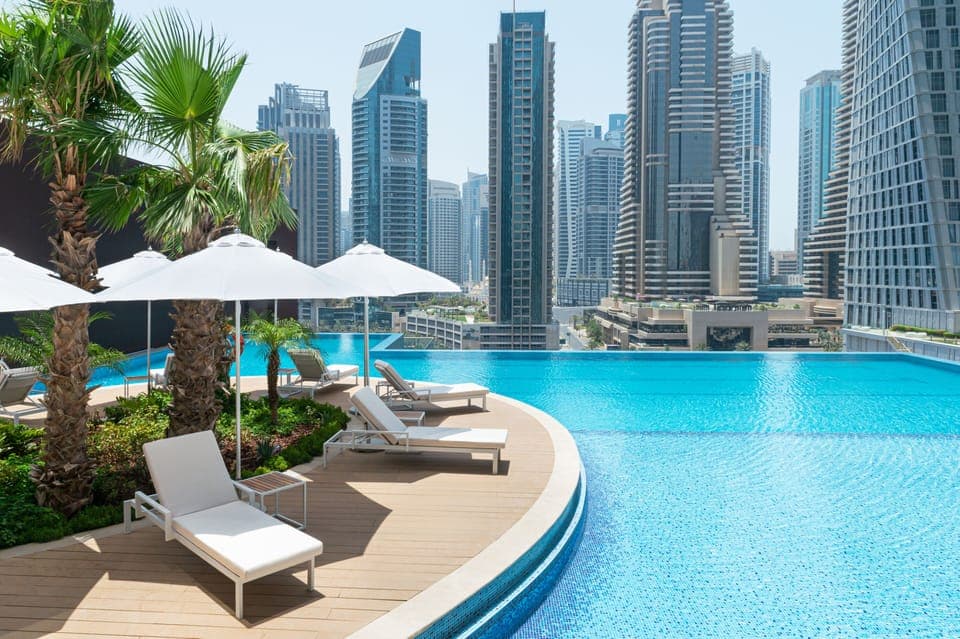 Outdoor pool, pool umbrellas, sun loungers