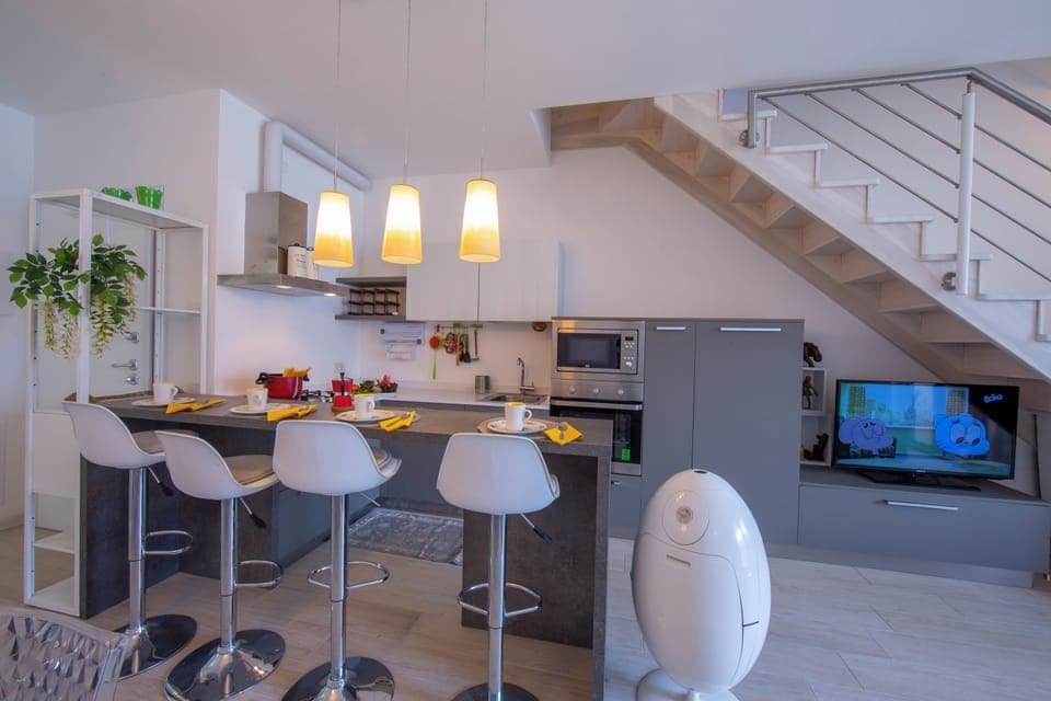 Family Apartment, Multiple Bedrooms, 2 Bathrooms, Mountainside (Como Lake Modern Apartment Ulivi) | Private kitchen | Full-size fridge, microwave, oven, stovetop