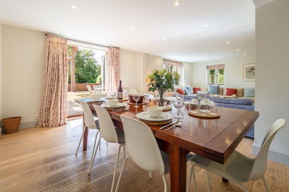 Alexander House, Thorpeness: Open-plan living space with dining table