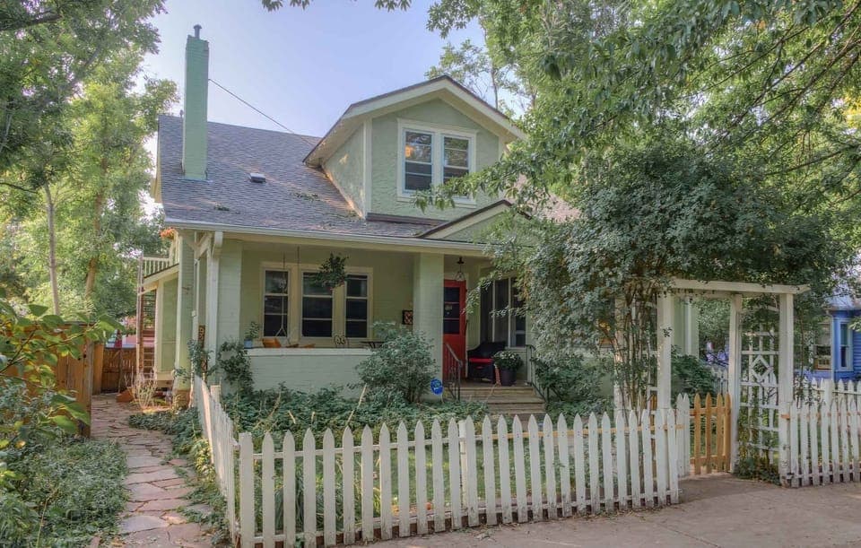 Beautiful historic main house photo. The apartment entrance is on the east side 