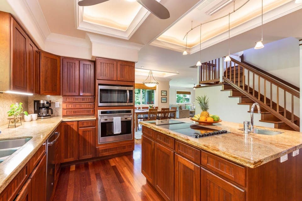 Kitchen, living room, dining room located downstairs.