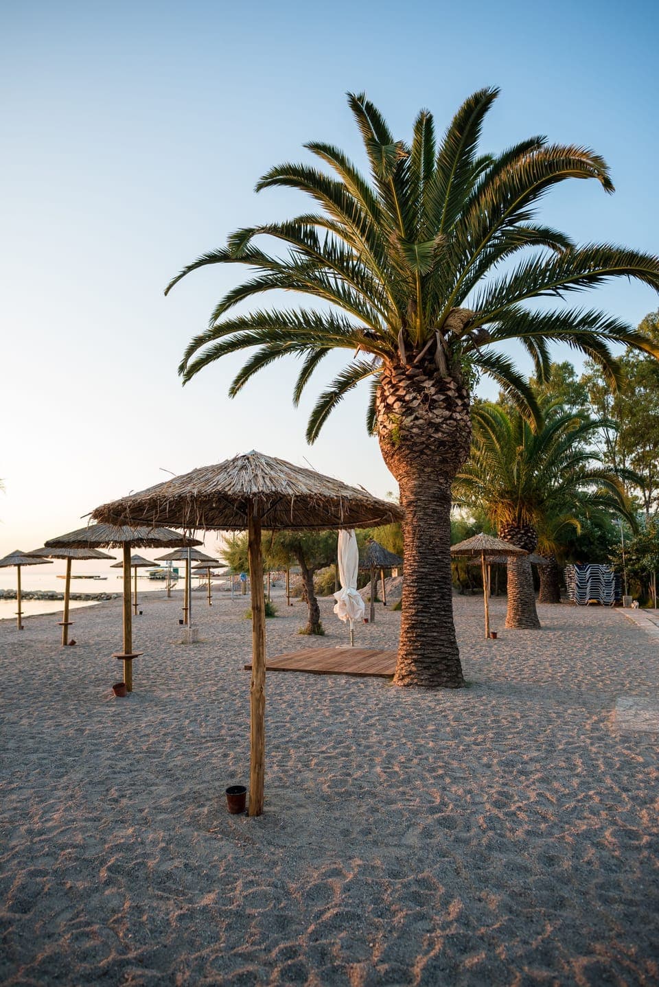 On the beach, sun loungers, beach umbrellas, beach bar