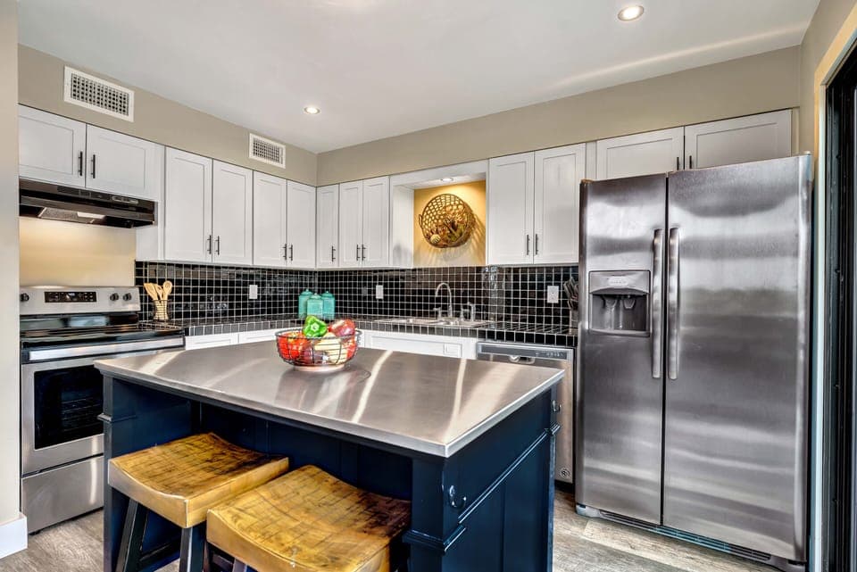 Chef's kitchen with stainless steel-topped island!