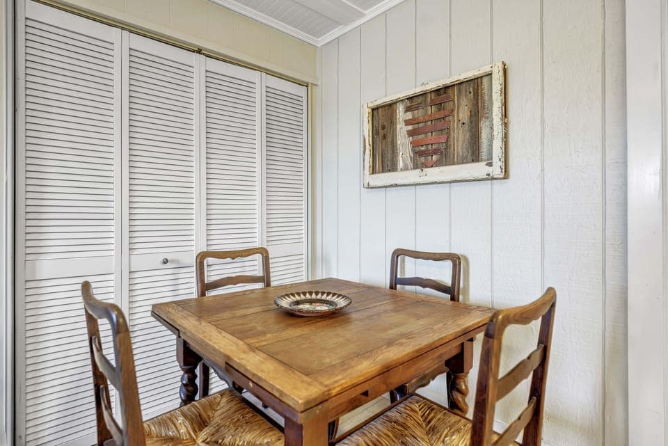 Lower level laundry closet with washer and dryer. 