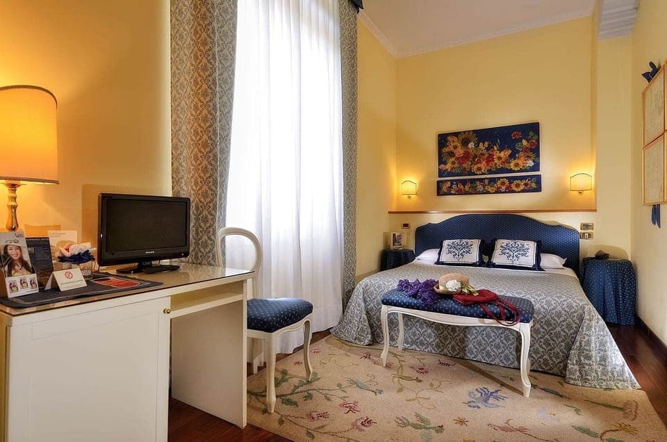 Deluxe Double or Twin Room | Minibar, in-room safe, desk, blackout drapes