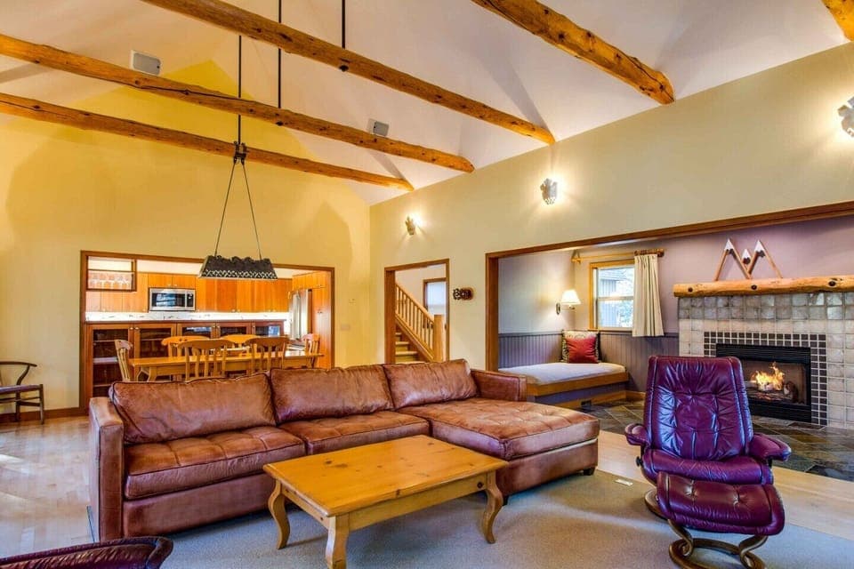 Open concept living room-- the dining room, kitchen, fireplace sitting room 