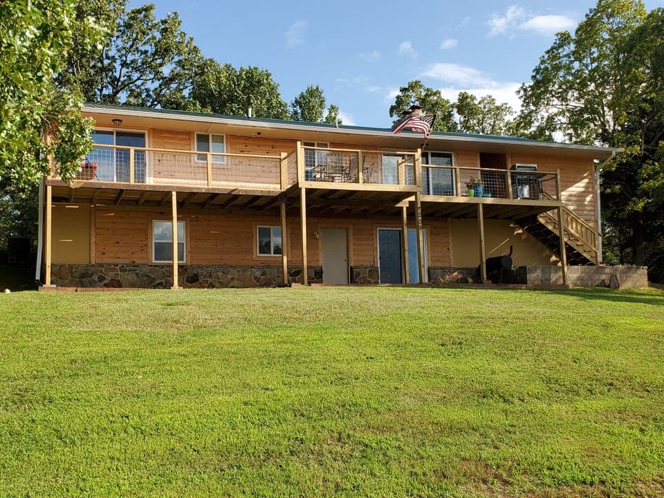 Back side of Cabin. Has Scenic View from Spacious Deck. Lower Level Walk-out.