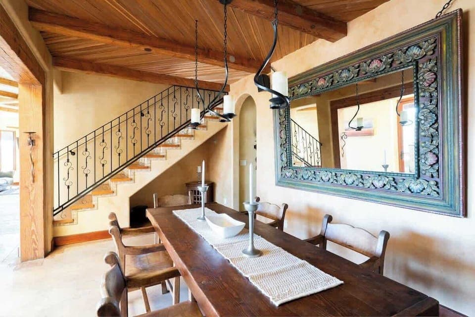 The rustic, reclaimed dining table is perfect for a big breakfast spread every morning