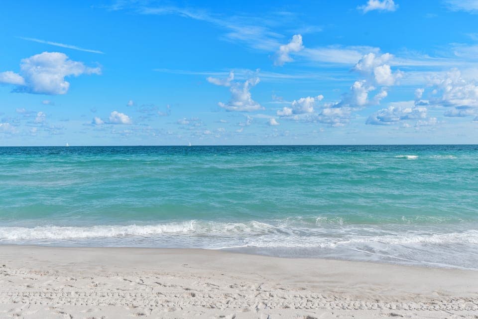On the beach, white sand