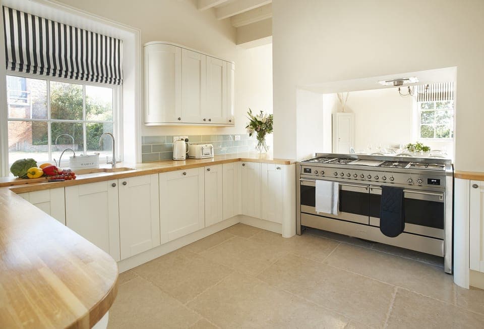 Ground floor: Well equipped kitchen leading through to dining area