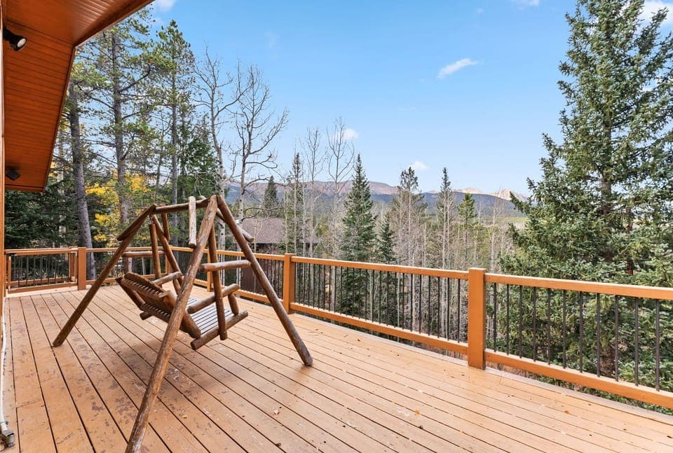Exterior: Large deck, outdoor seating, beautiful mountain and forest views