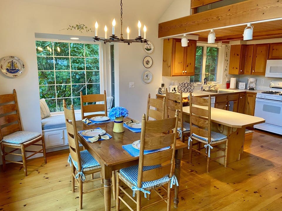The dining room area is open to the spacious kitchen and large eating bar!