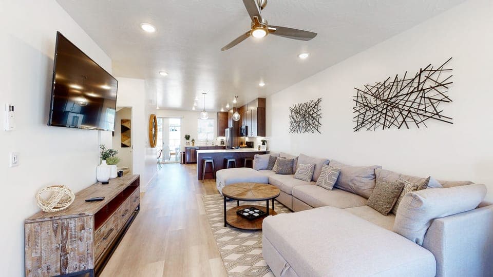 Spacious Living Room with lots of storage and games in TV console.