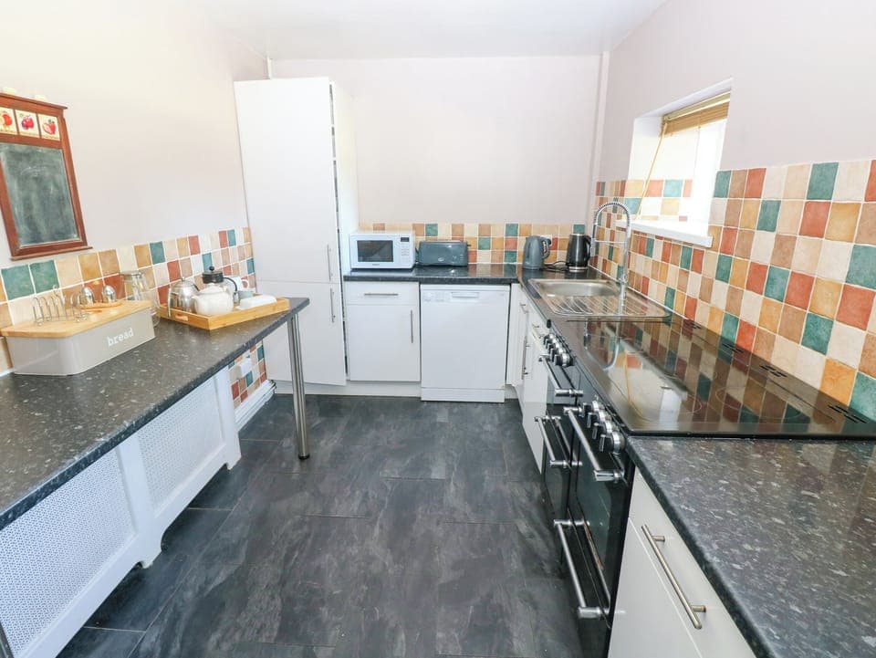 Fridge, dishwasher, cookware/dishes/utensils