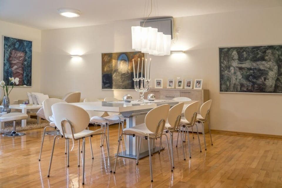 Chairs for 10 people around the dining table in the spacious living area on the ground floor of the modern villa with pool Primosten Oasis