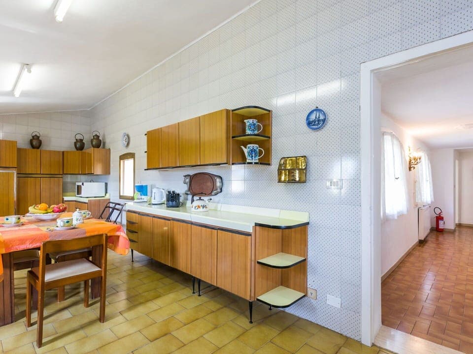 Furniture, Table, Cabinetry, Kitchen, Lighting, Wood, Interior Design, Floor, Flooring, Countertop