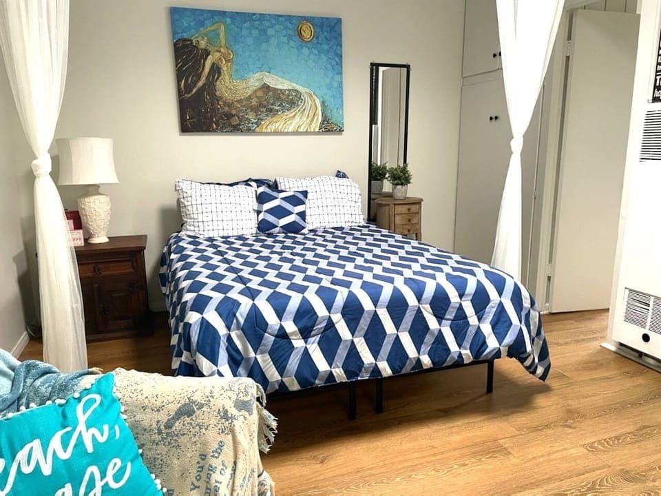Beach themed room with Queen bed, perfect spot to unwind!