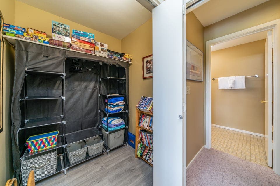 Lower level Bunk Room closet with Books, Games, Puzzles, DVDs for your use