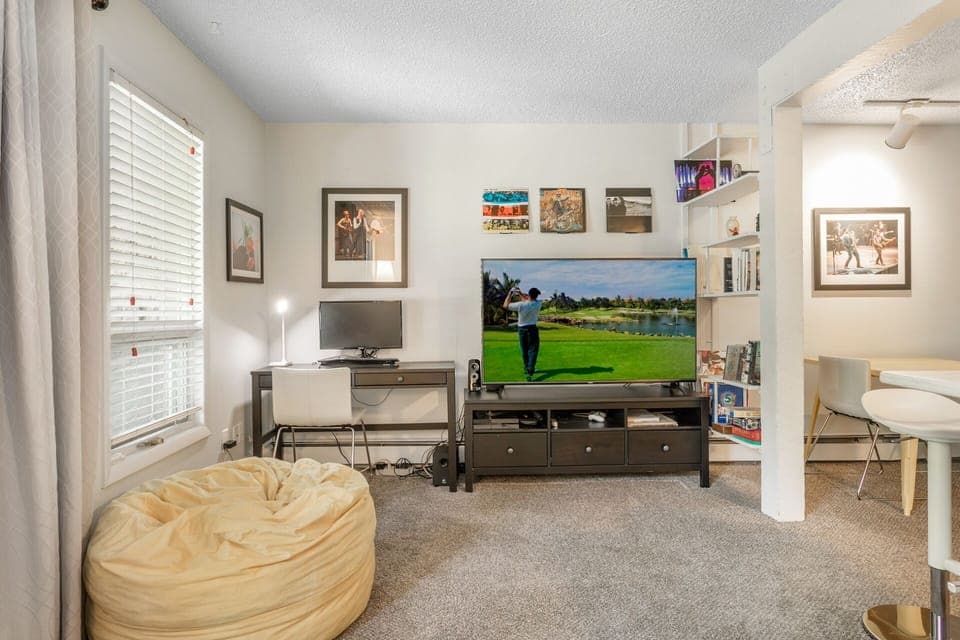 60 inch 4K TV, Desk with keyboard & monitor