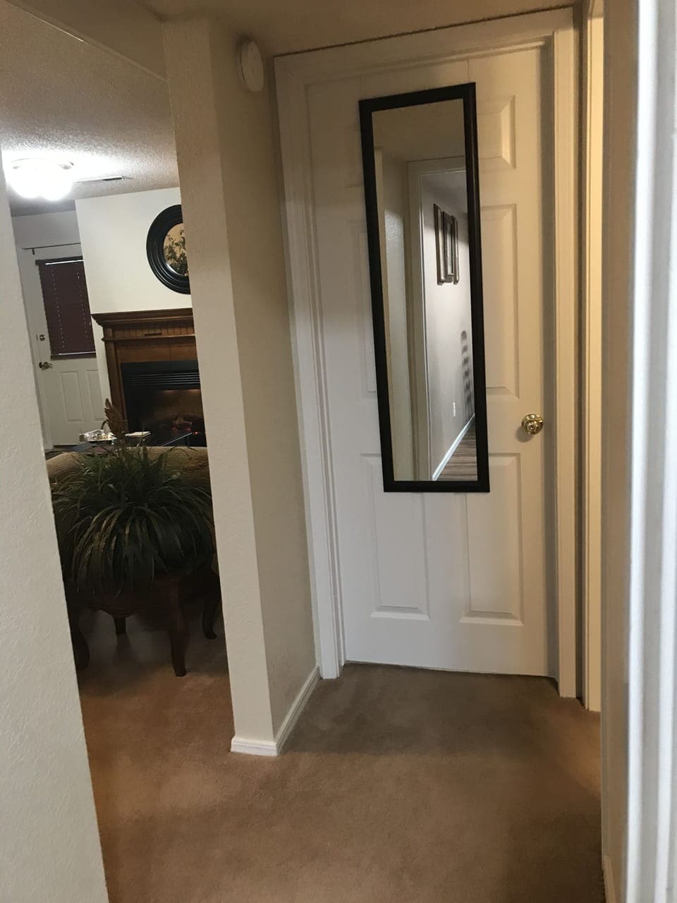 Centrally located full length mirror.